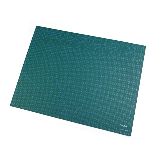 Double-sided cutting mat 45x60 cm - Teal (1 Piece) Double-sided cutting mat 45x60 cm - Teal (1 Piece)