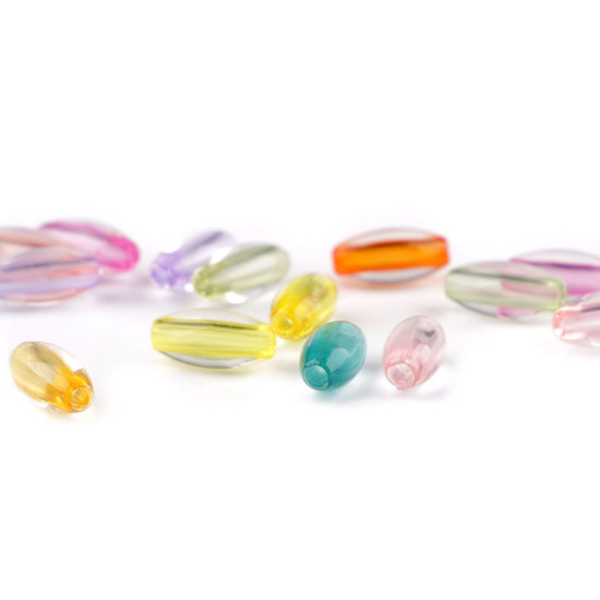 Átlátszó műanyag gyöngyök színes cérnával 6x12 mm ovális - Mix (20 Grammok) Átlátszó műanyag gyöngyök színes cérnával 6x12 mm ovális - Mix (20 Grammok)