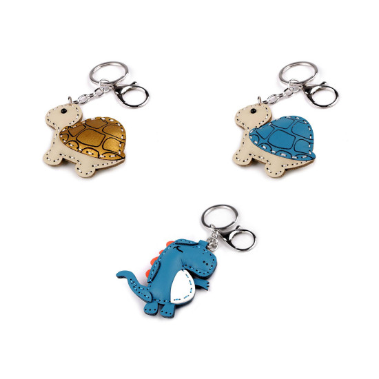 Backpack pendant / keychain - turtle, dinosaur - Gold (1 Piece) Backpack pendant / keychain - turtle, dinosaur - Gold (1 Piece)