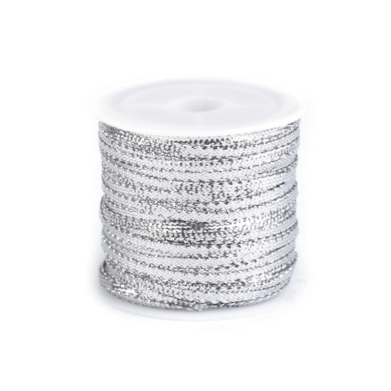 Wstążka szerokość 3 mm z lureksem - Srebrny (1 Sztuka) Wstążka szerokość 3 mm z lureksem - Srebrny (1 Sztuka)