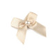 Satin bow 30x35 mm with bead - Cream lightest (50 Pieces) Satin bow 30x35 mm with bead - Cream lightest (50 Pieces)