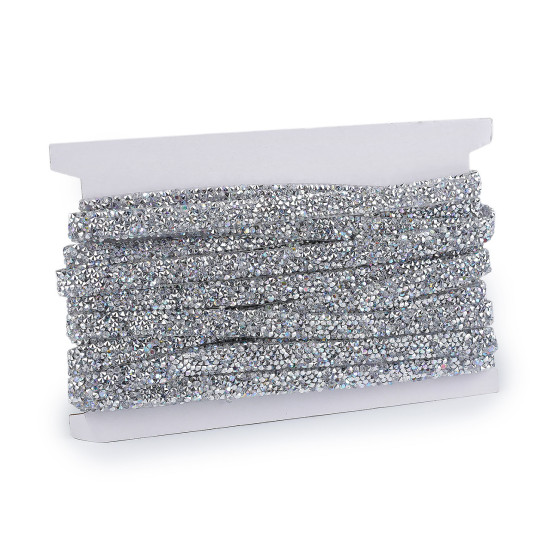 Iron-on trimming braid with rhinestones width 10 mm - Crystal ab (1 Meter) Iron-on trimming braid with rhinestones width 10 mm - Crystal ab (1 Meter)