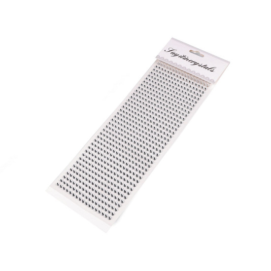 Self-adhesive rhinestones on an adhesive strip ø5 mm - Crystal (1 Card) Self-adhesive rhinestones on an adhesive strip ø5 mm - Crystal (1 Card)